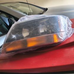 1999-2004 Jeep Grand Cherokee/Laredo Headlights (Brand New)