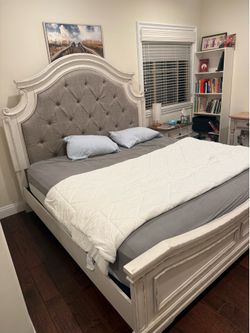 Realyn King Upholstered Panel Bed by Ashley