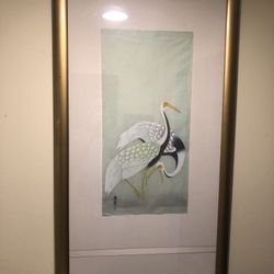 Framed Asian Crane Artwork with Light from above it.  