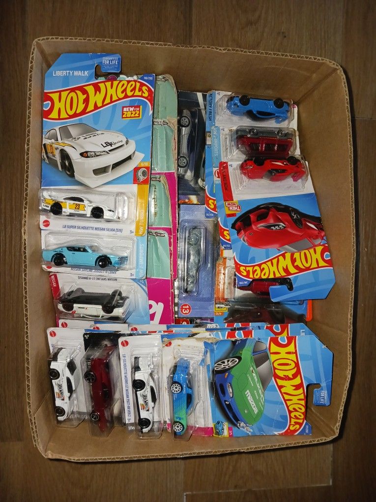 Box of Hot Wheels and Premiums