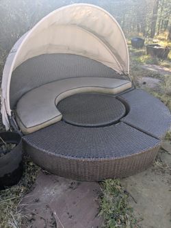 Four-Piece Rattan Daybed Set Missing A Couple Of Cushions