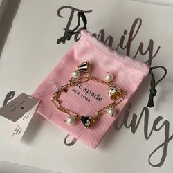 Kate Spade New York Alice in Wonderland TEA TIME Teacup Charm Bracelet.
