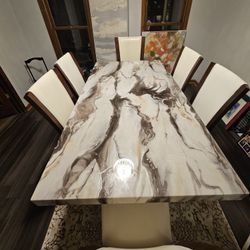 Unique Dining Set with marble finish + 6 leather high back chairs