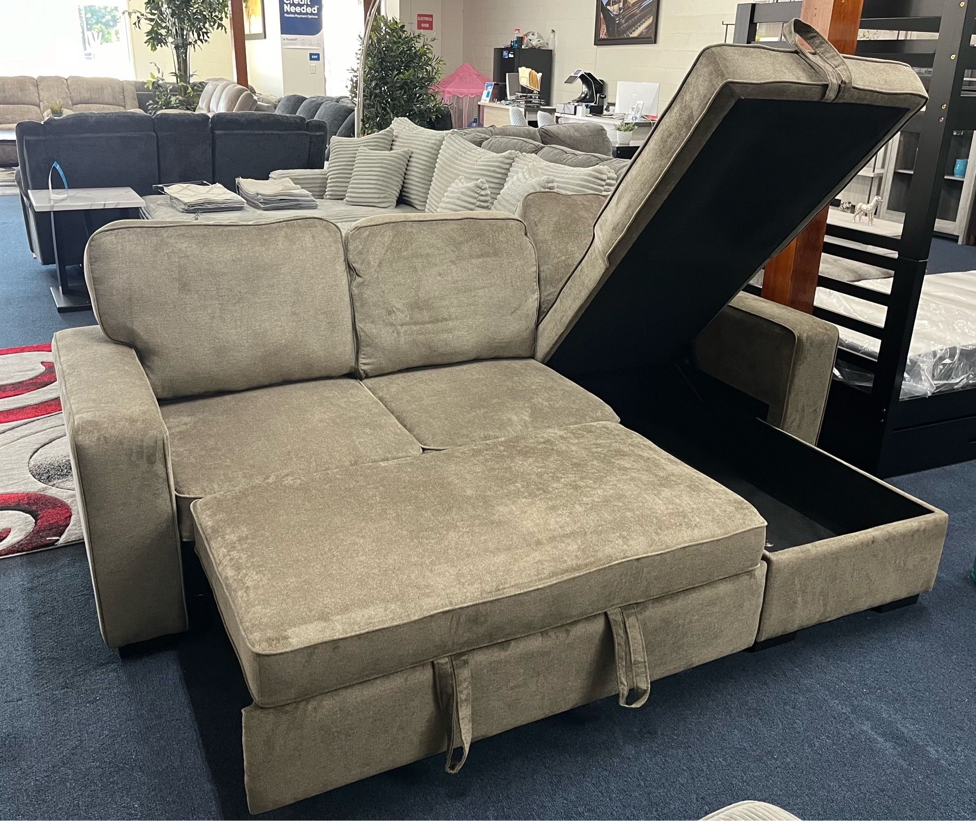 Warm grey reversible sleeper sectional w/ storage