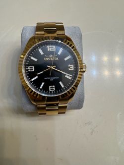 Gold invicta watch