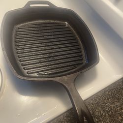 Two hard pan one with lines one without