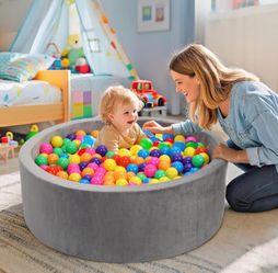 Gray foam ball pit for baby and toddler with multi color balls