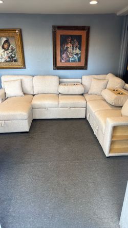 Large Sectional Sofa with Storage and Cup holders.