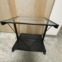 Metal table with the glass top