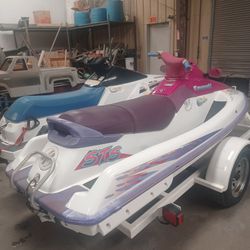 91 & 95 Jet Skis With Nice Trailer Pink Slips In Hand