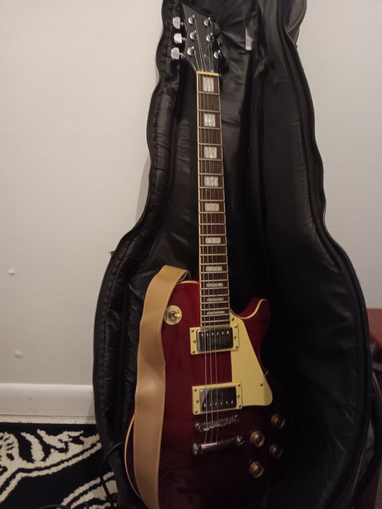 Silverstone Les Paul- Sunburst And Mustang Amp With Cables