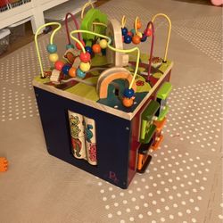 Used Wooden activity cube by B. Toys