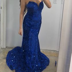 strapless blue sequin dress is brand new. Perfect for special occasions/prom