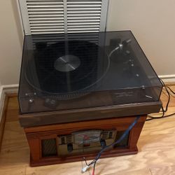 Two Record Vinyl Disc Players with table and cords. vintage music turntable collectable