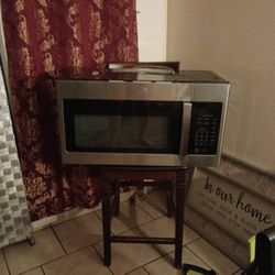 HOME OWNERS BRAND NEW GE Stainless Steel Over The Range Microwave