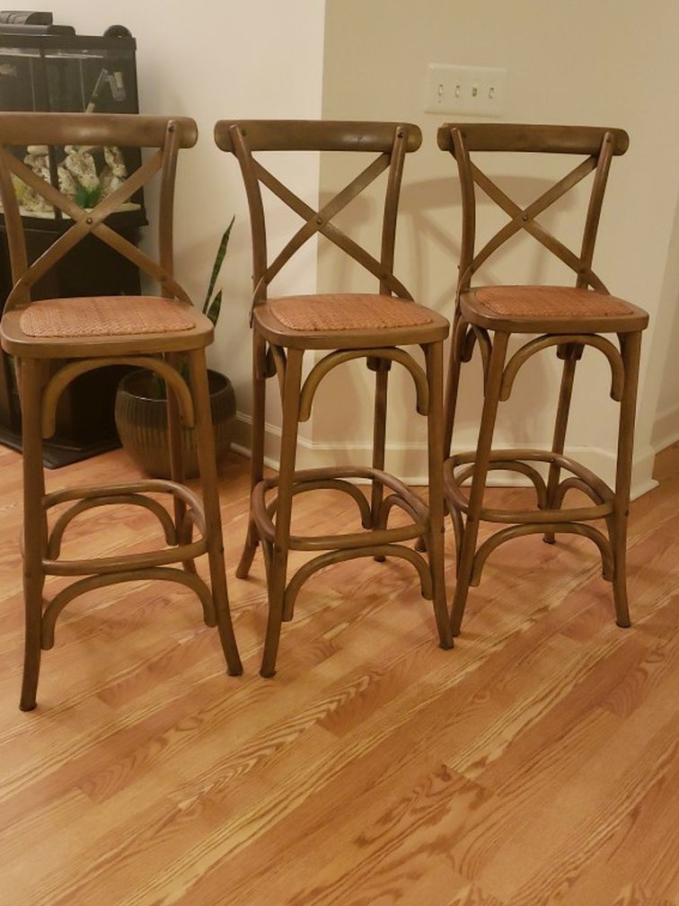 3 wooden chairs