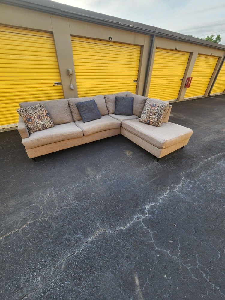 2pc Grey Sectional W/ Throw Pillows. $500. Will Deliver For A Fee