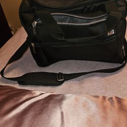 Delsey 13" black carry on bag