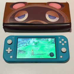 Nintendo Switch Lite + Leather Case and Charger