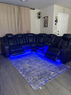 Black leather sectional power reclining