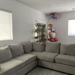 Grey L couches