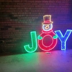 Joy Snowman Light Up Sign 48in High Brightly Lit Red, White, Blue, Green Letters