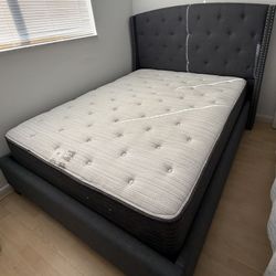 Queen-size bed with mattress