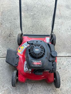 Yard Machines 20" Gas Push Lawn Mower and homelite electric trimmer