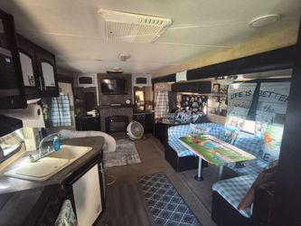 Double pop out travel trailer