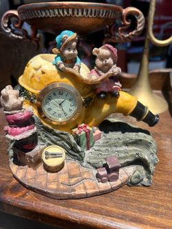 collectible resin table clock featuring a whimsical bear family theme