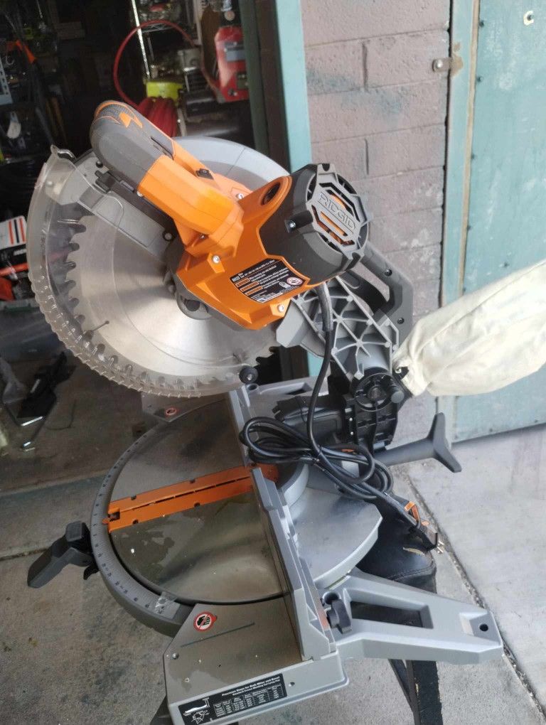 New Ridgid 12 in dual bevel miter saw no box