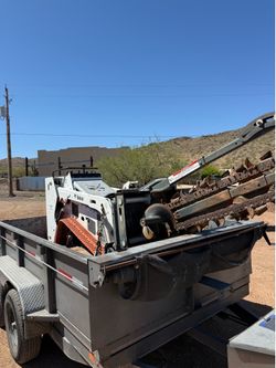 Bobcat mt85 with trencher , bump trailer