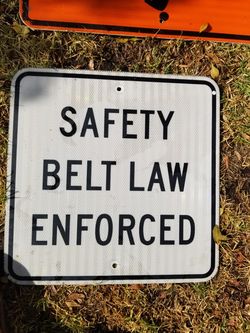 Safety belt law enforced sign