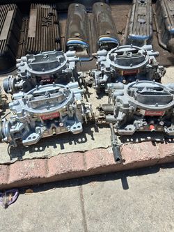 4 EDELBROCK CARBS!!! 2 GOOD!! 2 CORES!! 500$ FOR ALL