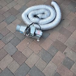 Dryer vent booster with expandable hose