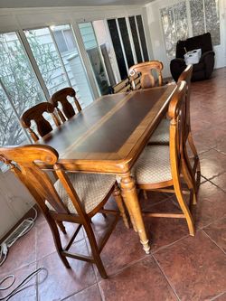 Tall table with six chairs