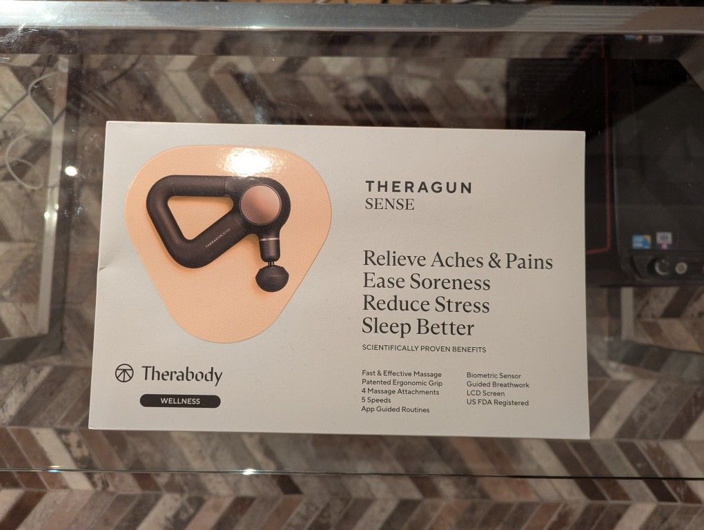 Theragun Sense (brand new never used)