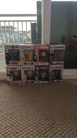 Eight Funko Pops