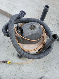 Rigid wet/dry vacuum