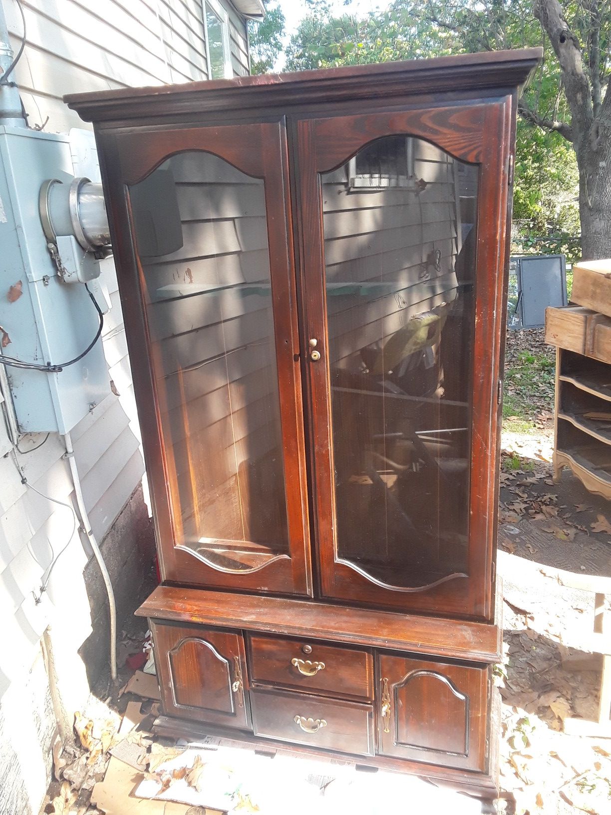 Antique gun cabinet