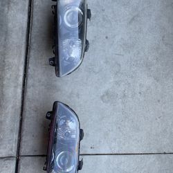 2008 - 2009 Pontiac Headlight Housing Set