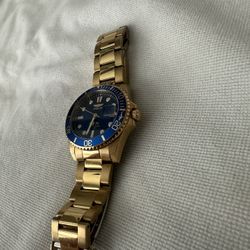 Gold Invicta Watch