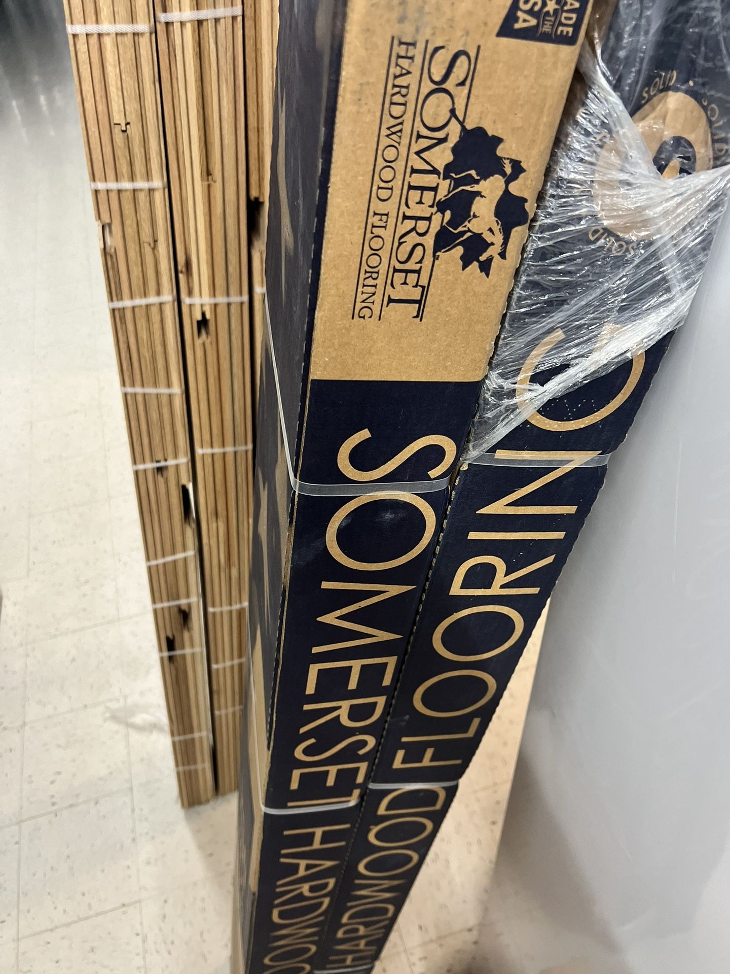 Two bundles Somerset prefinished hardwood flooring.  Color -smoke. Total 50 ft.²  