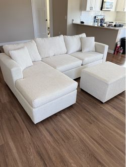 Brand new cream sectional with free ottoman ( happy customer )