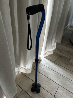 Adjustable Walking Cane with Quad Base