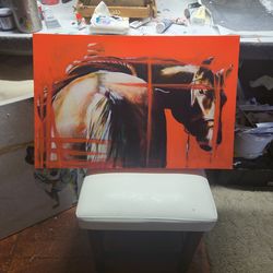Looking behind this is a 20 inch by 30-in painting print