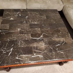 Granite/ cherry finish coffee table
