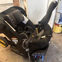 Doona Stroller/Car seat combo with base, stroller bag