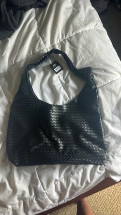 Black bag with weave pattern