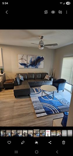 Grey Secrional with Ottoman For Sale. 